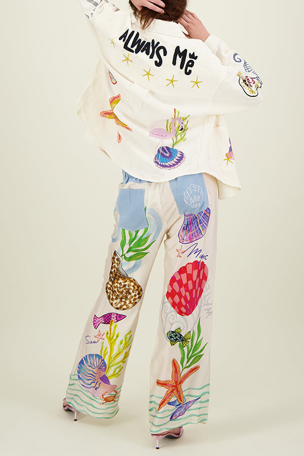 Zulema® | Blusa oversize in raso con stampa unica e abbottonatura e tasche