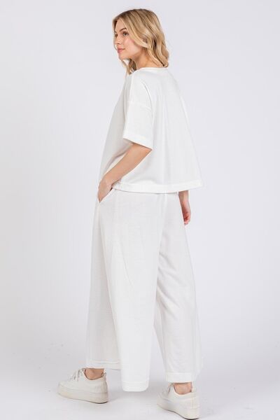 Yoselin® | Set top e pantaloni con mezza manica e mezzo bottone